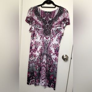 Sleet sleeve dress with beading on neckline